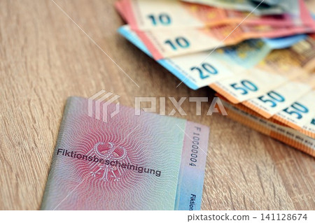 German temporary Permanent resident card specimen and euro money bills. Fiktionsbescheinigung German temporary Permanent resident card specimen and euro money bills. Fiktionsbescheinigung 141128674