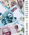 Mexican peso money bills pile on table. Mexico banknotes of MXN currency. Concept of business 141128785