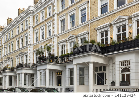 Victorian townhouse terrace with cream facades Victorian townhouse terrace with cream facades 141129424