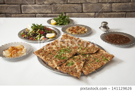 Turkish Pide - Konya Etli Ekmek Kebab with Minced Meat. Turkish Pide - Konya Etli Ekmek Kebab with Minced Meat. 141129626