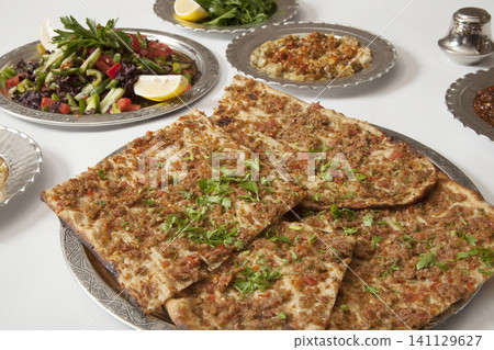 Turkish Pide - Konya Etli Ekmek Kebab with Minced Meat. Turkish Pide - Konya Etli Ekmek Kebab with Minced Meat. 141129627