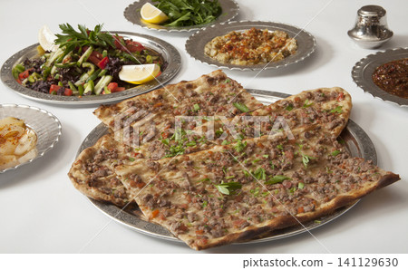 Turkish Pide - Konya Etli Ekmek Kebab with Minced Meat. Turkish Pide - Konya Etli Ekmek Kebab with Minced Meat. 141129630
