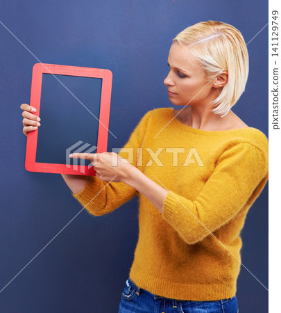 Woman, studio and point to frame board, presentation and mockup for advertisement, customer and checklist. Options, choice with idea for announcement and notification, information with female person Woman, studio and point to frame board, presentation and mockup for advertisement, customer and checklist. Options, choice with idea for announcement and notification, information with female person 141129749