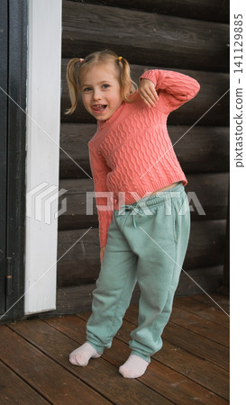 Young kid at home. Tranquil girl sitting comfortably. Content young girl relaxing peacefully with teddy bear toy. Calm happy child. Cozy bedroom portrait Caucasian blond hair child warm atmosphere Young kid at home. Tranquil girl sitting comfortably. Content young girl relaxing peacefully with teddy bear toy. Calm happy child. Cozy bedroom portrait Caucasian blond hair child warm atmosphere 141129885