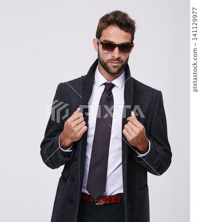 Studio, fashion and man with professional coat, sunglasses or eyewear for aesthetic, portrait and confidence. Adult, male person and guy with grey background, stylish and employee for business Studio, fashion and man with professional coat, sunglasses or eyewear for aesthetic, portrait and confidence. Adult, male person and guy with grey background, stylish and employee for business 141129977