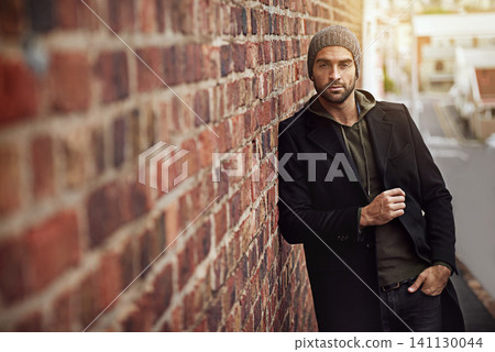 Man, portrait and urban style by brick wall downtown for aesthetic, modern and vacation for city culture. Male person, trendy winter outfit for streetwear fashion for creative career in New York Man, portrait and urban style by brick wall downtown for aesthetic, modern and vacation for city culture. Male person, trendy winter outfit for streetwear fashion for creative career in New York 141130044