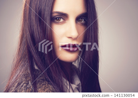 Studio, model and portrait with makeup, fur and beauty for natural proud attitude. Woman, cosmetics and clothes for confidence, glamour and elegance for chic fashionista isolated on white background Studio, model and portrait with makeup, fur and beauty for natural proud attitude. Woman, cosmetics and clothes for confidence, glamour and elegance for chic fashionista isolated on white background 141130054