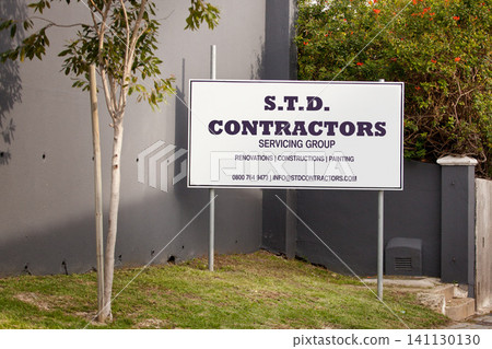 Contractor, poster and sign for advertising, outdoor and mistake with grammar, humor and comic text on lawn. Real estate group, board and error with language, houses and construction company on grass 141130130