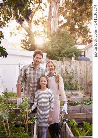 Portrait, garden and family with vegetables, sustainability and growth with happiness and eco friendly. Parents in a kitchen, outdoor and mother with father and girl with nature, farm and agriculture Portrait, garden and family with vegetables, sustainability and growth with happiness and eco friendly. Parents in a kitchen, outdoor and mother with father and girl with nature, farm and agriculture 141130174