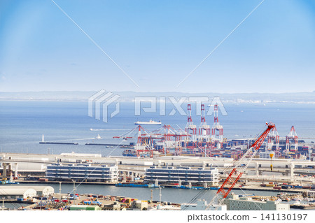 An aerial view of the container terminal and gantry cranes at Yokohama Port. An aerial view of the container terminal and gantry cranes at Yokohama Port. 141130197