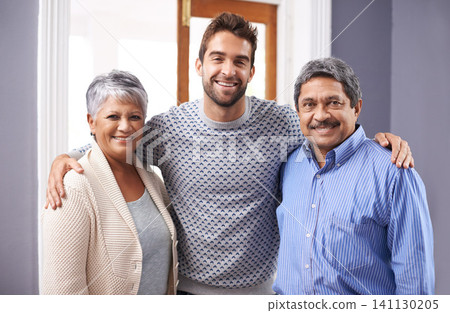 Hug, smile and portrait of family together at home, apartment and house for love, bonding and affection. Elderly couple, parents and man with mother, father and relatives happy in living room Hug, smile and portrait of family together at home, apartment and house for love, bonding and affection. Elderly couple, parents and man with mother, father and relatives happy in living room 141130205