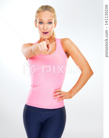Woman, portrait and pointing to choose you in studio, option and decision on white background. Female person, gesture and finger for motivation and sportswear for gym offer or signup, show and deal Woman, portrait and pointing to choose you in studio, option and decision on white background. Female person, gesture and finger for motivation and sportswear for gym offer or signup, show and deal 141130206