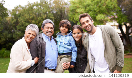 Portrait, smile and big family together in nature at garden for bonding, relationship or love at backyard. Face, park or child with parents, grandparents and happy mother with father for care outdoor 141130219