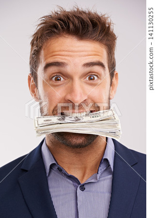 Portrait, business and man with cash in his mouth, financial and prize on white studio background. Face, accountant and trading with employee biting money or entrepreneur excited with bonus or salary Portrait, business and man with cash in his mouth, financial and prize on white studio background. Face, accountant and trading with employee biting money or entrepreneur excited with bonus or salary 141130255