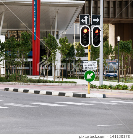 Road sign, traffic light and city with arrow for direction with travel information, typo or mistake for humor. Street, urban or metro buildings at bus stop, location and public transport in Cape Town Road sign, traffic light and city with arrow for direction with travel information, typo or mistake for humor. Street, urban or metro buildings at bus stop, location and public transport in Cape Town 141130378