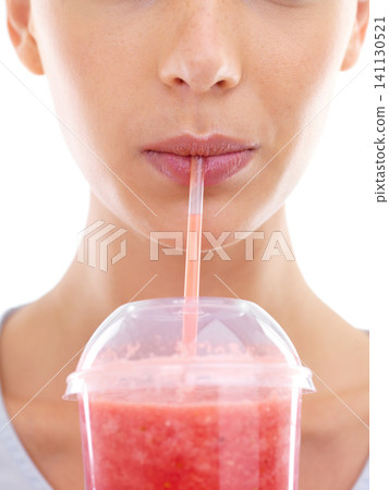 Woman, juice and straw in studio for fruit, healthy and smoothie for drink and vitamin. Young person or model and beverage for cold, refresh and strawberry for delicious and icy in plastic cup Woman, juice and straw in studio for fruit, healthy and smoothie for drink and vitamin. Young person or model and beverage for cold, refresh and strawberry for delicious and icy in plastic cup 141130521