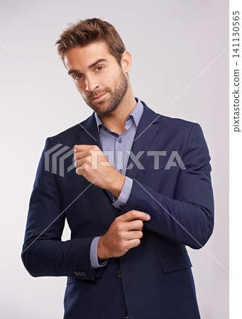 Portrait, studio and businessman with smile, confidence and corporate fashion with pride. Salesman, consultant or entrepreneur man in business suit with stylish gentleman clothes on white background Portrait, studio and businessman with smile, confidence and corporate fashion with pride. Salesman, consultant or entrepreneur man in business suit with stylish gentleman clothes on white background 141130565
