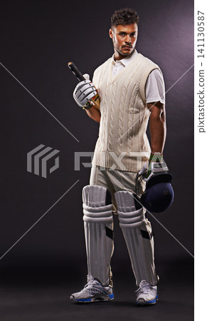 Man, portrait and cricket player with bat in studio for professional sports, competition or black background. Male person, face and match gear for workout confidence or practice, gloves or mockup Man, portrait and cricket player with bat in studio for professional sports, competition or black background. Male person, face and match gear for workout confidence or practice, gloves or mockup 141130587