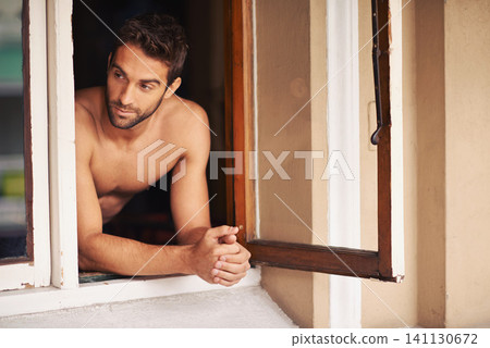 Man, shirtless or window to relax, thinking or memory of break, idea or vision of dream summer home. Guy, tourist or planning of body, vacation or future of leisure, recreation or relaxation as rest Man, shirtless or window to relax, thinking or memory of break, idea or vision of dream summer home. Guy, tourist or planning of body, vacation or future of leisure, recreation or relaxation as rest 141130672