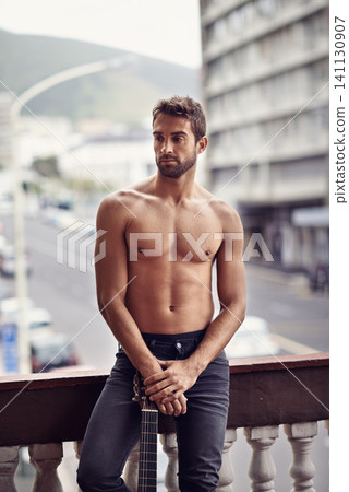 Sexy, muscles and shirtless man on balcony, natural body and thinking male person with music idea and instrument outside. Confident, topless and abs in summer with guitar, standing in Puerto Rico Sexy, muscles and shirtless man on balcony, natural body and thinking male person with music idea and instrument outside. Confident, topless and abs in summer with guitar, standing in Puerto Rico 141130907