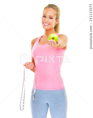 White background, portrait and woman giving apple with smile for diet, healthy and wellness for body. Adult, female person and girl with fruit on hand for nutrition, breakfast and vegan in studio White background, portrait and woman giving apple with smile for diet, healthy and wellness for body. Adult, female person and girl with fruit on hand for nutrition, breakfast and vegan in studio 141131073