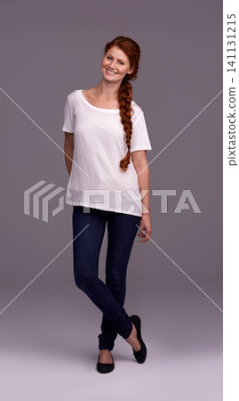 Studio, fashion and portrait of woman with confidence for trendy clothes, stylish and happy on grey background. Female person, face and smile with pose for cool outfit, satisfaction and pride Studio, fashion and portrait of woman with confidence for trendy clothes, stylish and happy on grey background. Female person, face and smile with pose for cool outfit, satisfaction and pride 141131215