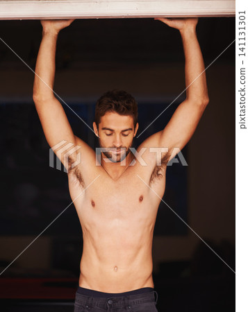 Home, muscular and man with confidence, happy and wellness with body and health in a doorway. Person, apartment and relax with guy and natural with training and weekend break with peace and workout Home, muscular and man with confidence, happy and wellness with body and health in a doorway. Person, apartment and relax with guy and natural with training and weekend break with peace and workout 141131301