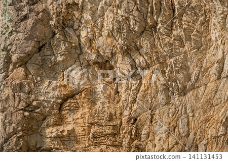 Rugged rock surface Rugged rock surface 141131453