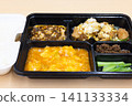 Delicious Chinese bento box with fried chicken and shrimp in chili sauce 141133334