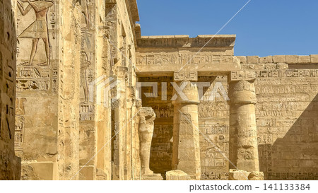 Medinet Habu, the mortuary temple of Ramesses III, located on the west bank of Luxor, Egypt. 141133384