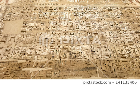 Beautiful bas-reliefs and ancient hieroglyphs from the mortuary temple of Ramesses III at Medinet Habu, Luxor, Egypt. Beautiful bas-reliefs and ancient hieroglyphs from the mortuary temple of Ramesses III at Medinet Habu, Luxor, Egypt. 141133400