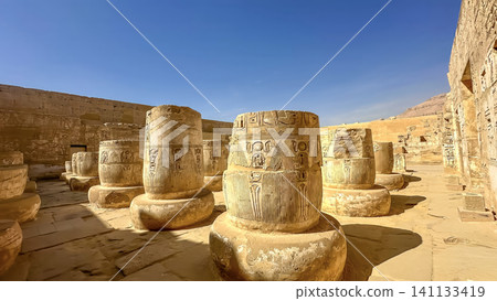 Medinet Habu, the mortuary temple of Ramesses III, located on the west bank of Luxor, Egypt. 141133419