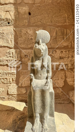 Statue of the Egyptian lioness goddess Sekhmet at the Medinet Habu Temple, Luxor, Egypt. Statue of the Egyptian lioness goddess Sekhmet at the Medinet Habu Temple, Luxor, Egypt. 141133450