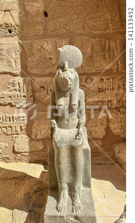 Statue of the Egyptian lioness goddess Sekhmet at the Medinet Habu Temple, Luxor, Egypt. Statue of the Egyptian lioness goddess Sekhmet at the Medinet Habu Temple, Luxor, Egypt. 141133452