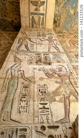 Beautiful bas-reliefs and ancient hieroglyphs from the mortuary temple of Ramesses III at Medinet Habu, Luxor, Egypt. Beautiful bas-reliefs and ancient hieroglyphs from the mortuary temple of Ramesses III at Medinet Habu, Luxor, Egypt. 141133526