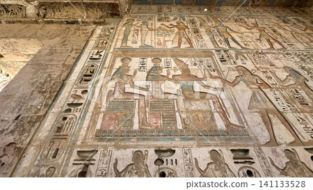 Beautiful bas-reliefs and ancient hieroglyphs from the mortuary temple of Ramesses III at Medinet Habu, Luxor, Egypt. Beautiful bas-reliefs and ancient hieroglyphs from the mortuary temple of Ramesses III at Medinet Habu, Luxor, Egypt. 141133528