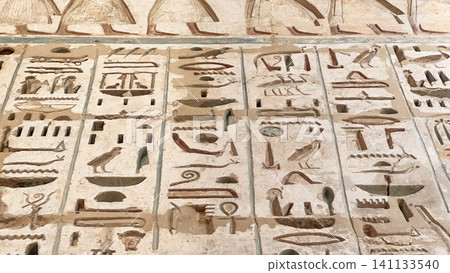 Beautiful bas-reliefs and ancient hieroglyphs from the mortuary temple of Ramesses III at Medinet Habu, Luxor, Egypt. Beautiful bas-reliefs and ancient hieroglyphs from the mortuary temple of Ramesses III at Medinet Habu, Luxor, Egypt. 141133540