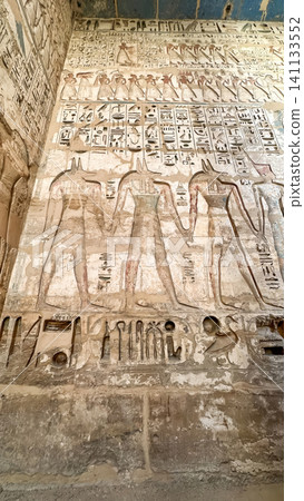 Beautiful bas-reliefs and ancient hieroglyphs from the mortuary temple of Ramesses III at Medinet Habu, Luxor, Egypt. Beautiful bas-reliefs and ancient hieroglyphs from the mortuary temple of Ramesses III at Medinet Habu, Luxor, Egypt. 141133552