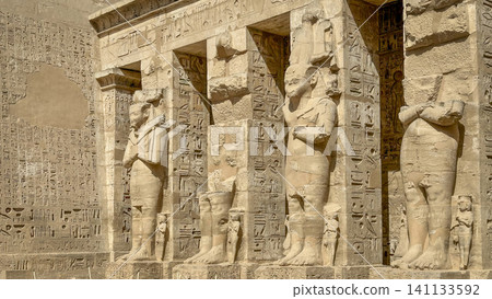 Medinet Habu, the mortuary temple of Ramesses III, located on the west bank of Luxor, Egypt. 141133592