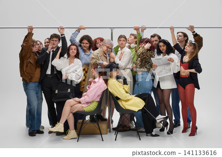 Diverse commuters packed inside crowded subway carriage during rush hour. Diverse commuters packed inside crowded subway carriage during rush hour. 141133616