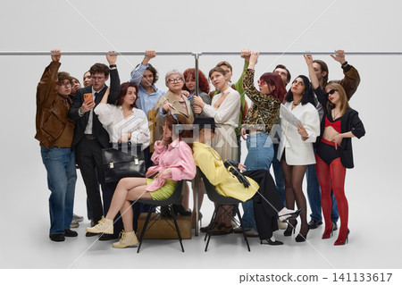 Diverse commuters packed inside busy subway carriage during rush hour. Diverse commuters packed inside busy subway carriage during rush hour. 141133617