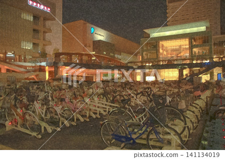 The vast bicycle parking area in front of the former JR Gifu Station is bathed in the warm glow of the city lights. The vast bicycle parking area in front of the former JR Gifu Station is bathed in the warm glow of the city lights. 141134019