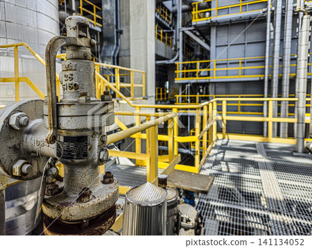 A valve is on a metal structure A valve is on a metal structure 141134052