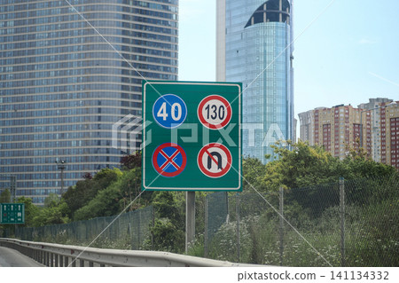 Road signs show speed limits and restrictions in a city Road signs show speed limits and restrictions in a city 141134332