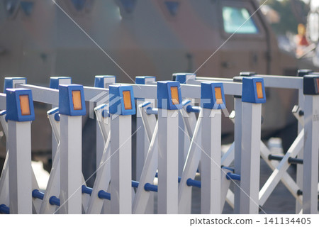 Barriers with orange lights at an urban location Barriers with orange lights at an urban location 141134405