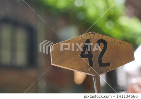 Unique sign displaying number 42 in outdoor setting Unique sign displaying number 42 in outdoor setting 141134660