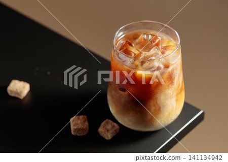 Iced coffee with cream and natural ice. Iced coffee with cream and natural ice. 141134942