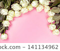 beautiful white roses on a pink background. place for text. top view background 141134962