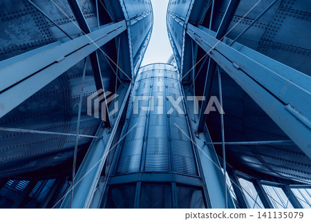 Modern silos for storing grain harvest. Agriculture. Modern silos for storing grain harvest. Agriculture. 141135079