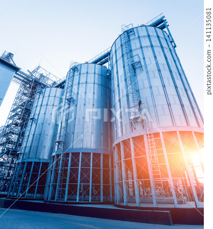 Modern silos for storing grain harvest. Agriculture. Modern silos for storing grain harvest. Agriculture. 141135081